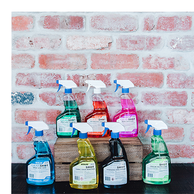 Assorted cleaning chemicals in spray bottles